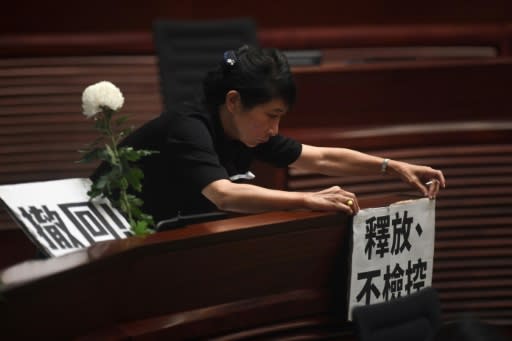 In a tense session, Hong Kong opposition lawmakers criticised the government's handling of the political crisis