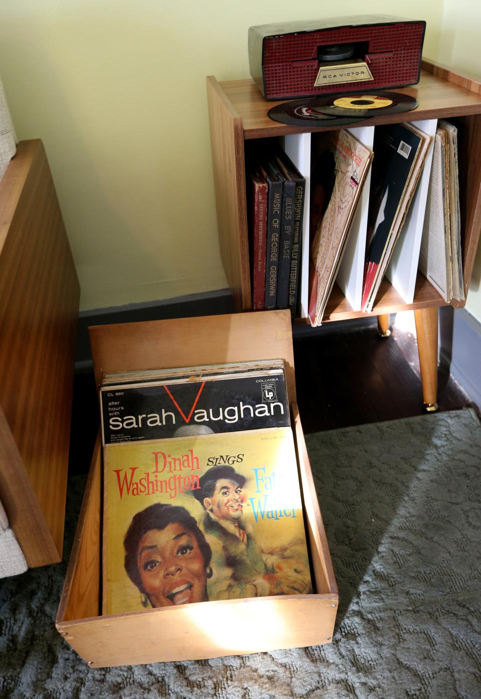 Record albums from the 1950s sit in the living room Monday, Oct. 30, 2023, in the 1950s African American Worker’s Home exhibit at The History Museum in South Bend. The new exhibit, which formerly housed the 1930s Polish Worker’s Home, will tell the community’s African American history as well as the Great Migration and the Civil Rights Movement through guided tours and special programs there beginning Nov. 9.