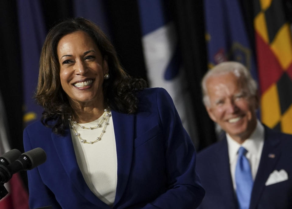 WILMINGTON, DE - AUGUST 12: Sen. Kamala D. Harris (D-Calif.) smiles after being introduced by presumptive Democratic presidential nominee Joe Biden as his running mate during an event at Alexis I. DuPont High School in Wilmington, Del., on Wednesday, Aug. 12, 2020. The former vice presidents historic selection makes Harris the first Black woman and first Asian American to run for vice president on a major-party ticket.   (Photo by Toni L. Sandys/The Washington Post via Getty Images)