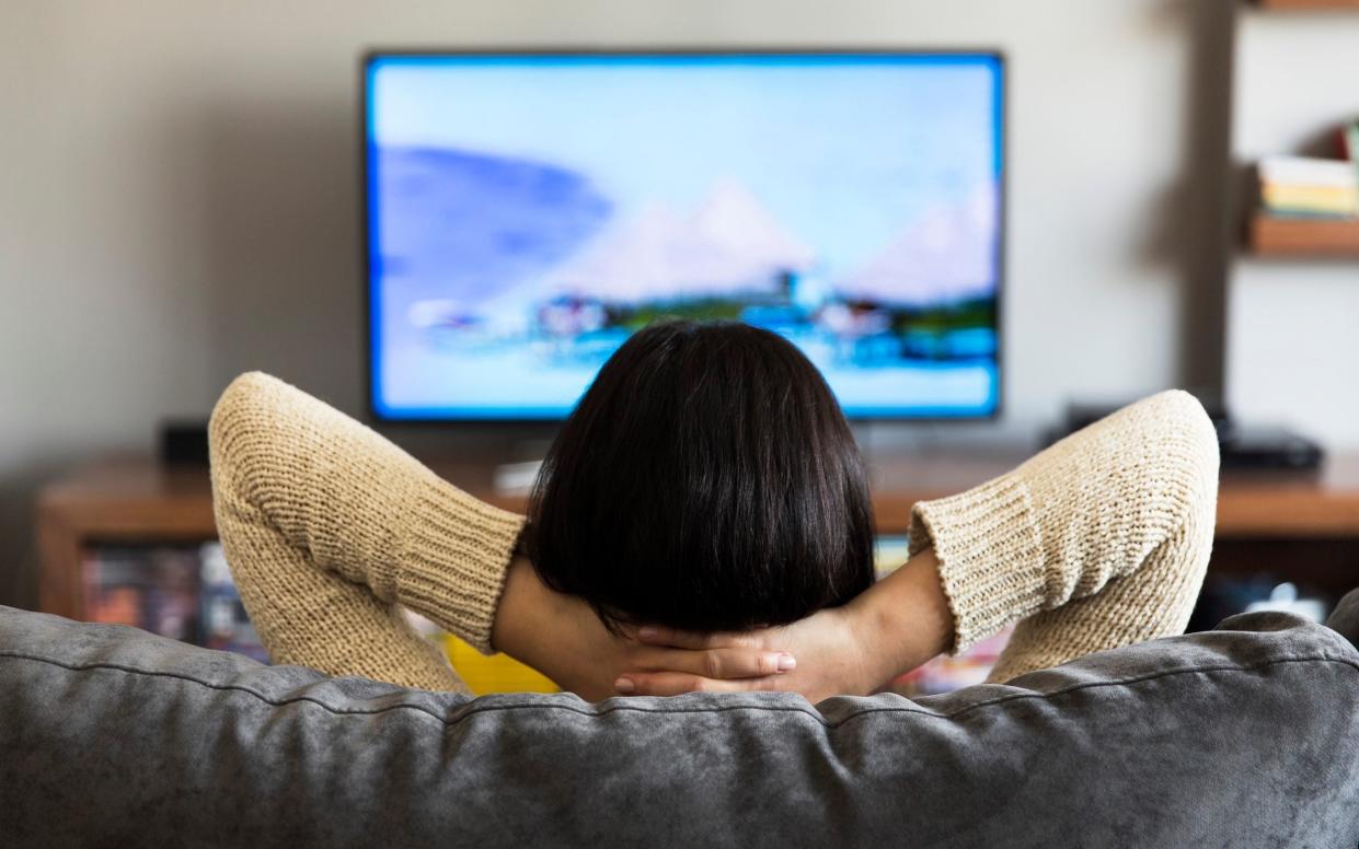 Woman watches TV