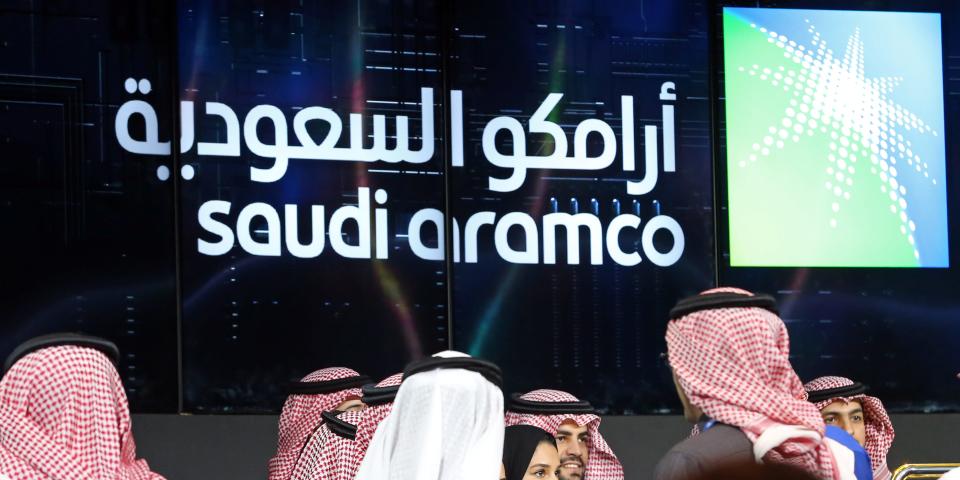 Participants attend the official ceremony marking the debut of Saudi Aramco's initial public offering (IPO) on the Riyadh's stock market, in Riyadh, Saudi Arabia, December 11, 2019. REUTERS/Ahmed Yosri       