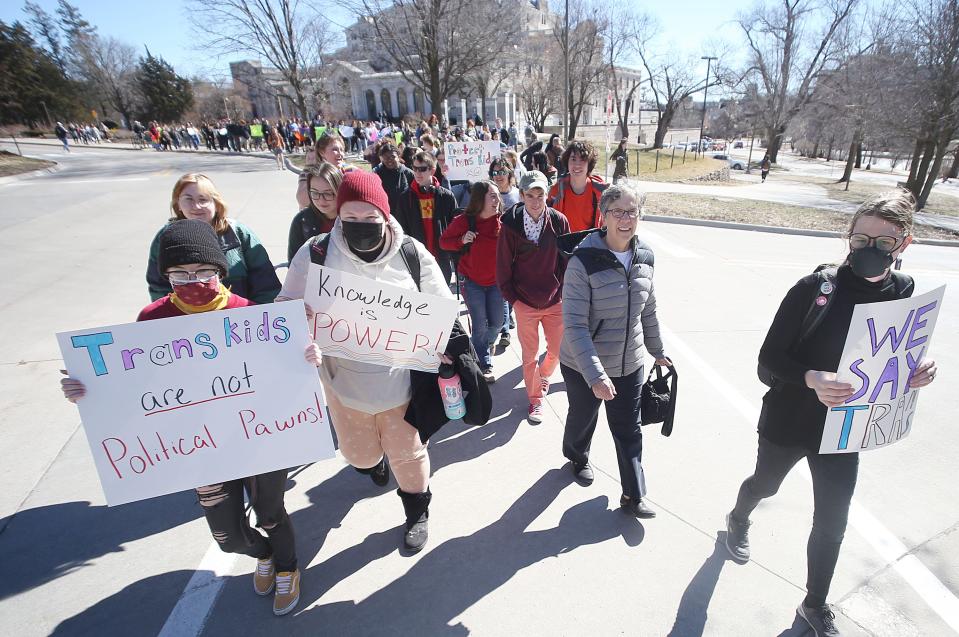 Iowa State University students walk out of class to protest bills introduced in the Iowa Legislature that discriminate against the rights of LGBTQ people on Wednesday, March 1, 2023, in Ames, Iowa.