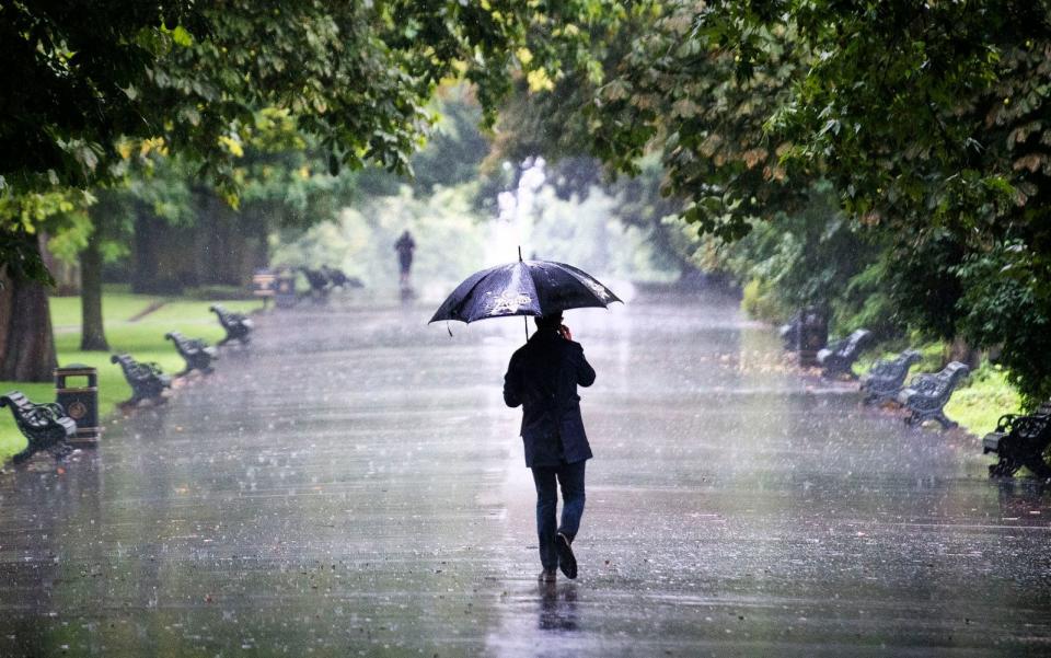 August rain in Regents Park, London - PA