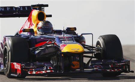 Red Bull Formula One driver Sebastian Vettel of Germany drives during the Austin F1 Grand Prix at the Circuit of the Americas in Austin November 17, 2013. REUTERS/Mike Stone