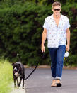 <p>Chris Pine enjoys the warm weather in a short-sleeved button down, cuffed jeans and flip flops while walking his dog in Los Angeles on Wednesday. </p>