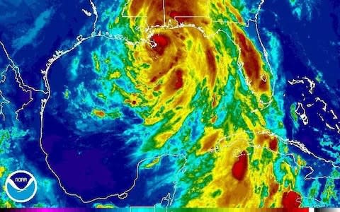 This enhanced infrared satellite image made available by the National Oceanic and Atmospheric Administration shows Hurricane Nate approaching the mouth of the Mississippi River on Saturday, Oct. 7, 2017 - Credit: AP
