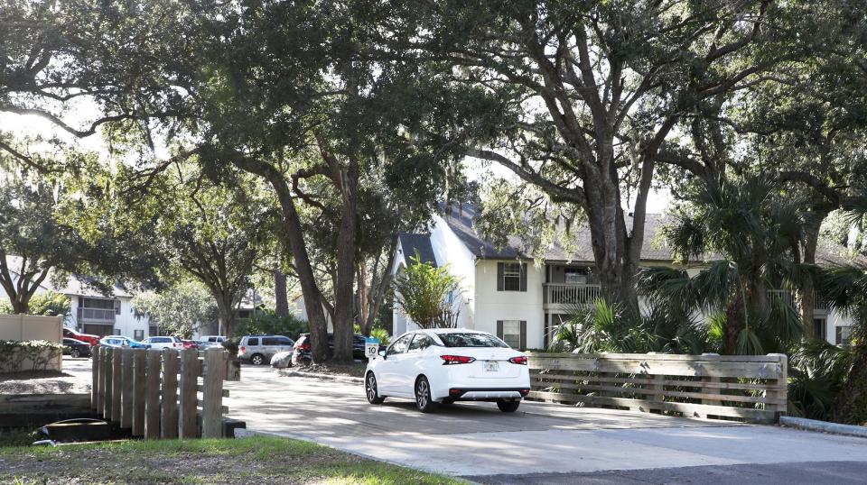 A car drives across the small bridge at the Ocean Oaks Apartments at 1645 Dunlawton Ave. in Port Orange on Monday, Nov. 20, 2023. The 1988-built 296-unit complex sold on Nov. 14 for $53 million. It's the biggest real estate deal of the year so far for Volusia County.