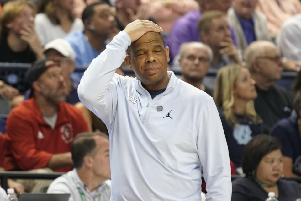 North Carolina head coach Hubert Davis reacts after a turnover during the first half of an NCAA college basketball game against Virginia at the Atlantic Coast Conference Tournament in Greensboro, N.C., Thursday, March 9, 2023. (AP Photo/Chuck Burton)