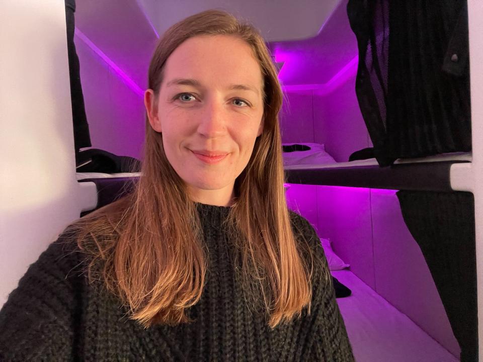 The author stands in front of Air New Zealand's new "Skynest."