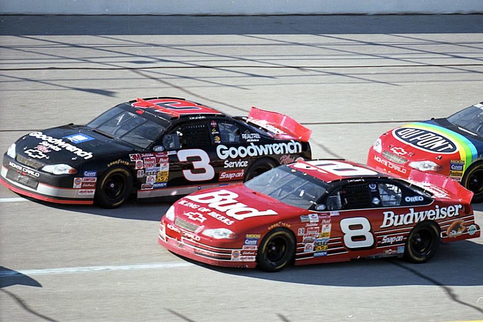 Dale Earnhardt Sr. and Jr. race at Talladega in 2000. (Getty)