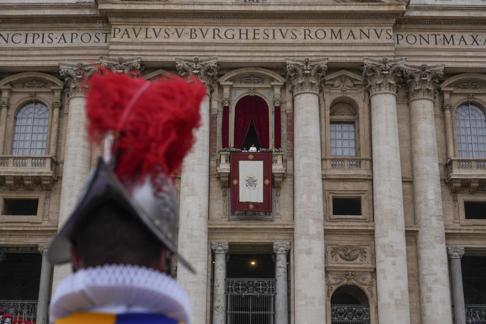 Pope Francis speaks before delivering the Urbi et Orbi (Latin for 'to the city and to the world' ) Christmas' day blessing from the main balcony of St. Peter's Basilica at the Vatican, Monday Dec. 25, 2023. (AP Photo/Gregorio Borgia)
