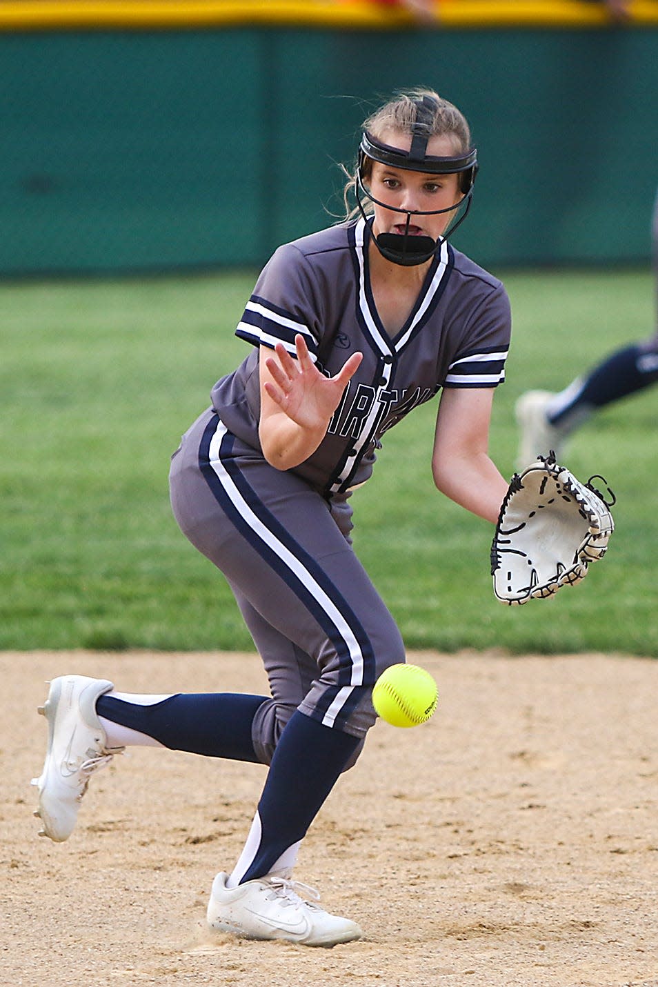 Ridgewood shortstop Clara Franks preps to make a play in Tuesday's Class 1A sectional semifinal against Peru St. Bede. The Spartans fell to the Bruins 4-3 in nine innings in Williamsfield.