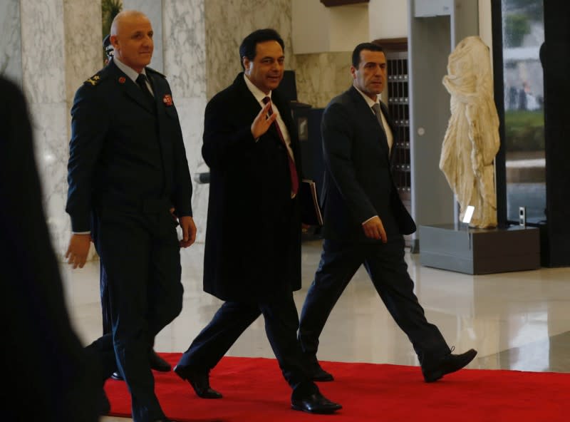 Lebanon's Prime Minister Hassan Diab arrives at the presidential palace in Baabda