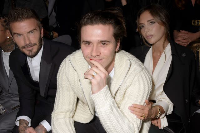 <p>David M. Benett/Dave Benett/Getty Images</p> David Beckham, Brooklyn Beckham and Victoria Beckham