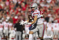 Nebraska's Luke Reimer, obscured at rear, knocks away a pass intended for Ohio State's Jeremy Ruckert (88), which forced a turnover on downs during the first half of an NCAA college football game Saturday, Nov. 6, 2021, at Memorial Stadium in Lincoln, Neb. (AP Photo/Rebecca S. Gratz)