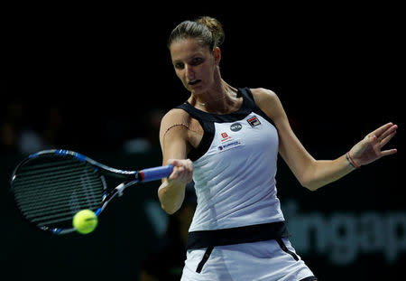 Karolina Pliskova of the Czech Republic in action against Agnieszka Radwanska of Poland. Singapore WTA Finals Round Robin Singles - Singapore Indoor Stadium, Singapore - 28/10/2016. REUTERS/Edgar Su