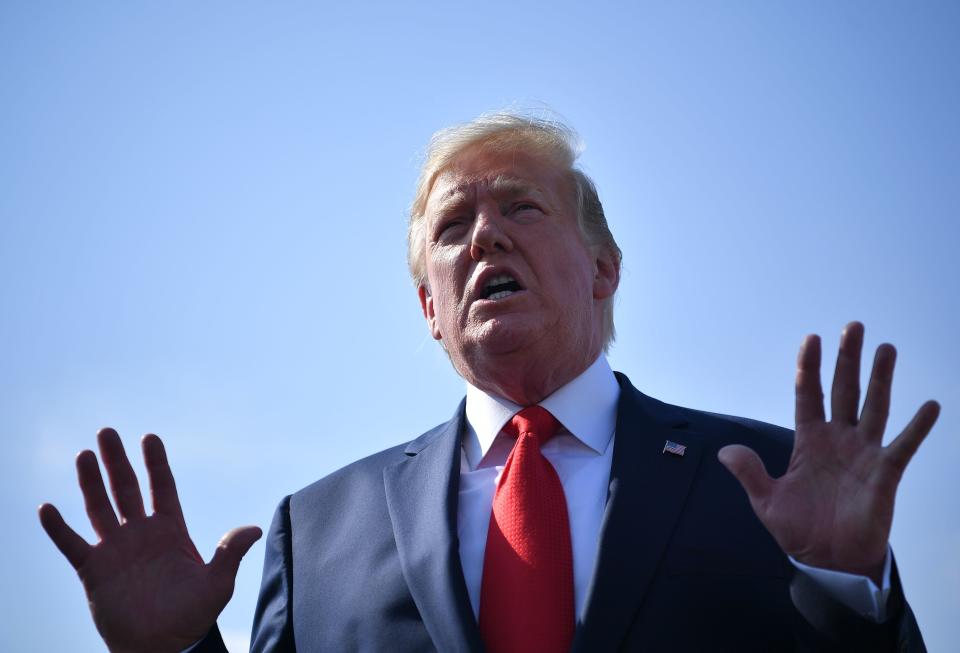 US President Donald Trump speaks to the press before departing from Morristown Municipal Airport in Morristown, New Jersey on July 7, 2019. - Trump is returning to Washington after spending the weekend at his Bedminster golf resort. (Photo by MANDEL NGAN / AFP)        (Photo credit should read MANDEL NGAN/AFP/Getty Images)