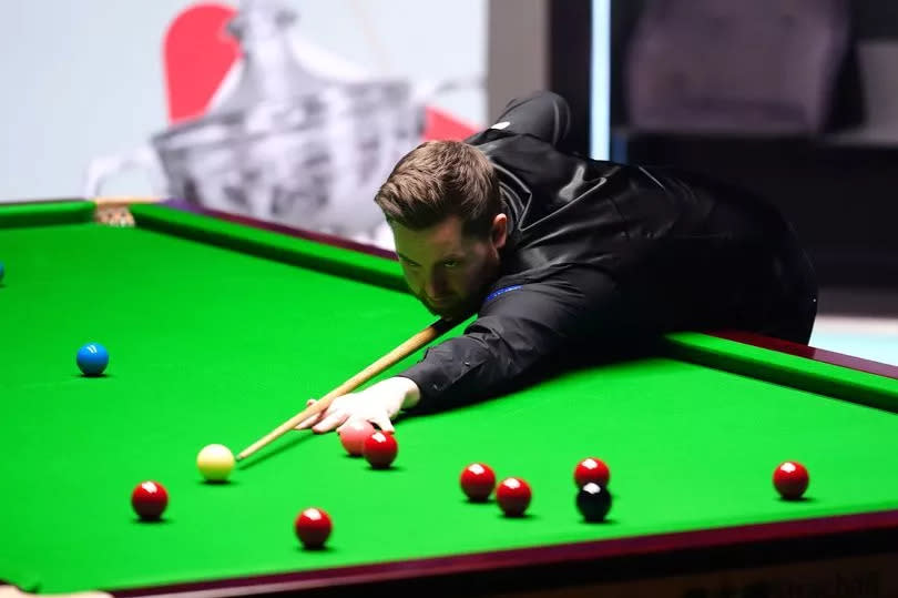 Jak Jones in action against Kyren Wilson (not pictured) during the final of the 2024 Cazoo World Snooker Championship -Credit:PA Wire
