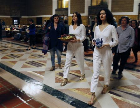 Members of the L.A. Dance Project perform the opera "Invisible Cities" at the Amtrak's Union Station in Los Angeles November 15, 2013. REUTERS/Fred Prouser