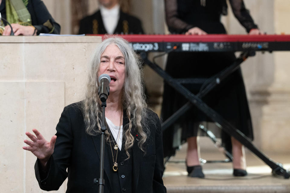 Patti Smith performs at the Académie des Beaux-Arts in Paris.