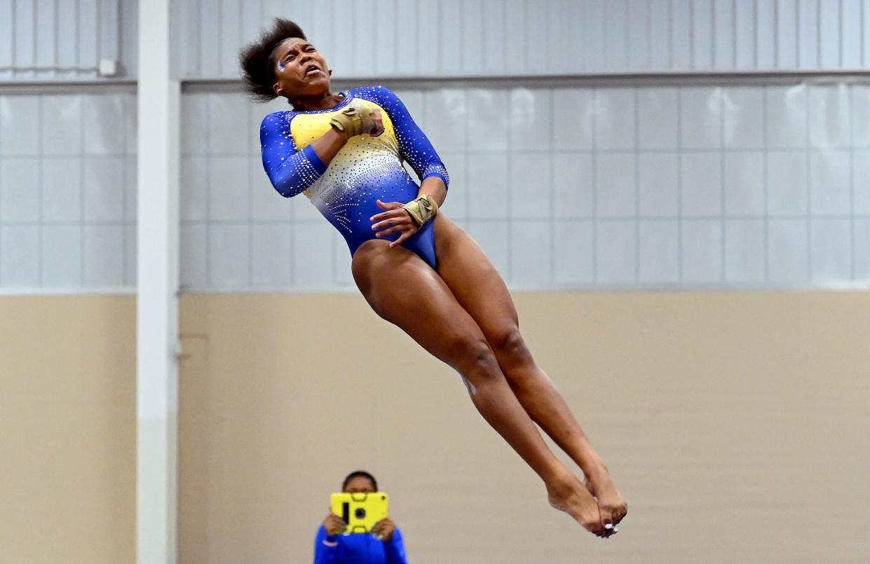 Fisk University gymnast Morgan Price competes on the vault during the Tennessee Collegiate Classic meet Friday, Jan. 20, 2023, in Lebanon, Tenn. Fisk is the first historically Black university to have an intercollegiate women’s gymnastics team.