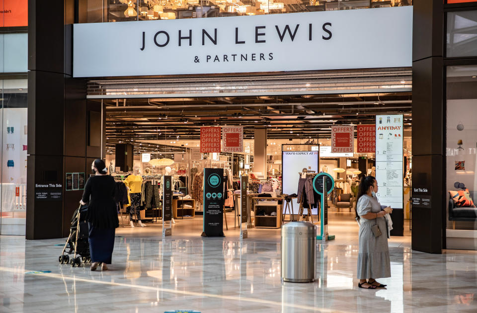 People seen outside John Lewis & Partners, a brand of high-end department stores in London. (Photo by May James / SOPA Images/Sipa USA)