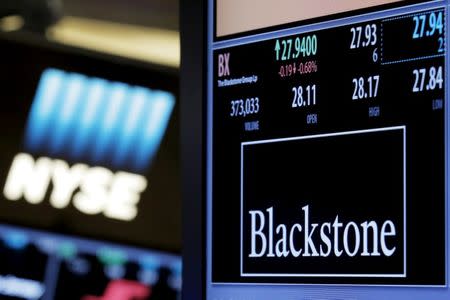 FILE PHOTO -- The ticker and trading information for Blackstone Group is displayed at the post where it is traded on the floor of the New York Stock Exchange (NYSE) April 4, 2016. REUTERS/Brendan McDermid/File Photo - RTS135C2