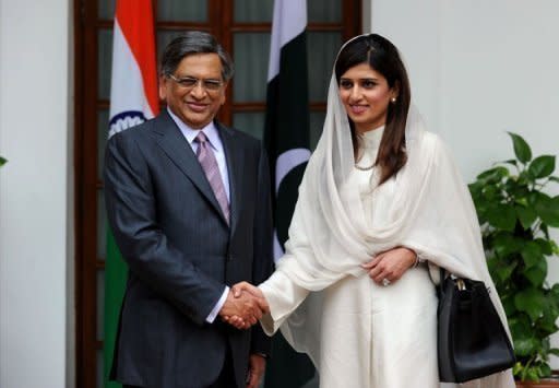 Indian Foreign Minister S. M. Krishna (L) greets his Pakistani counterpart Hina Rabbani Khar ahead of talks in New Delhi. India and Pakistan's foreign ministers insisted relations were back on track Wednesday after peace talks that highlighted a "new era" of cooperation over the ruptures of the past