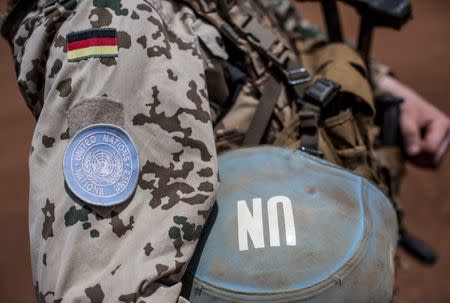 FILE PHOTO: A German soldier from the UN contingent MINUSMA stands at Camp Castor in Gao, Mali April 5, 2016. REUTERS/Michael Kappeler/Pool/File Photo