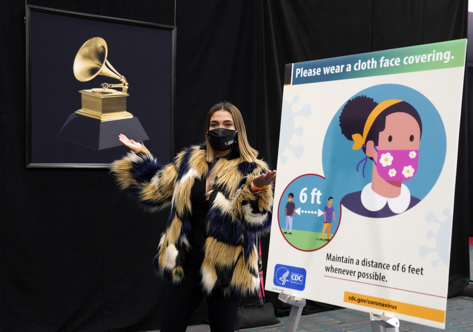 Associated Press entertainment reporter Marcela Isaza poses backstage at the 63rd Grammy Awards at the Los Angeles Convention Center, Thursday, March 11, 2021. The awards show will air on Sunday. (AP Photo/Chris Pizzello)