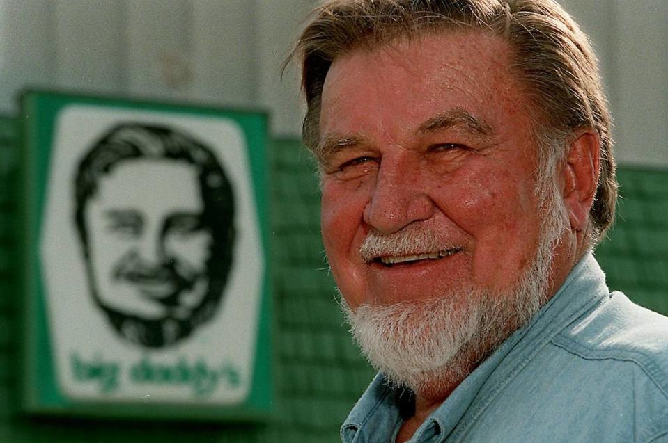 In 1989, Joe Flanigan, the original “Bid Daddy,” stands in front of one of the Big Daddy liquor stores with his image on the logo.