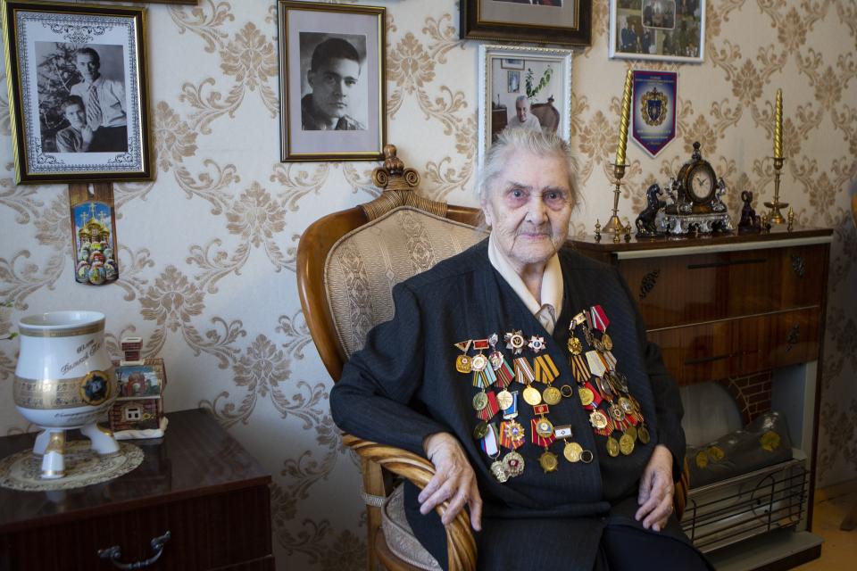 In this photo taken on Thursday, April 30, 2020, Valentina Efremova, a 96-year-old World War II veteran, who served as a nurse in field hospitals on the frontlines throughout the war, speaks during her interview with the Associated Press in Yakutsk, Russia . (AP Photo/Alex Lee)