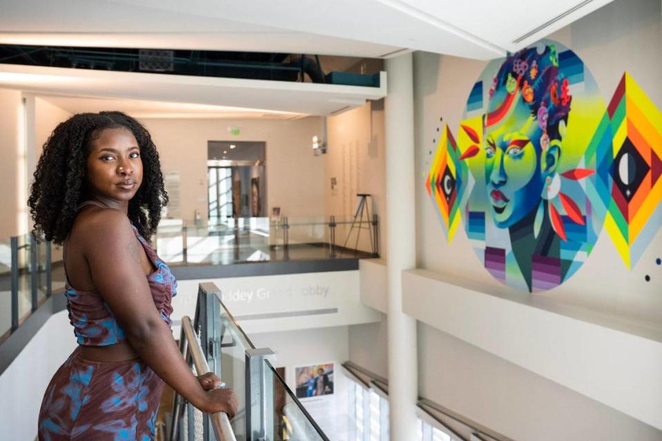 Local muralist and artist Georgie Nakima was commissioned to create a large-scale mural, titled “Earth Keeper”, within the Harvey B. Gantt Center for African-American Arts + Culture. Melissa Melvin-Rodriguez/mrodriguez@charlotteobserver.com