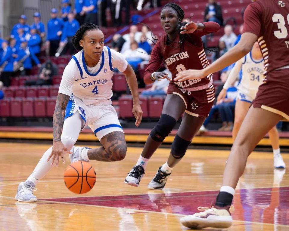 Eniya Russell (4) scored a career-high 21 points and made the game-winning basket with four-tenths of a second left Thursday night.