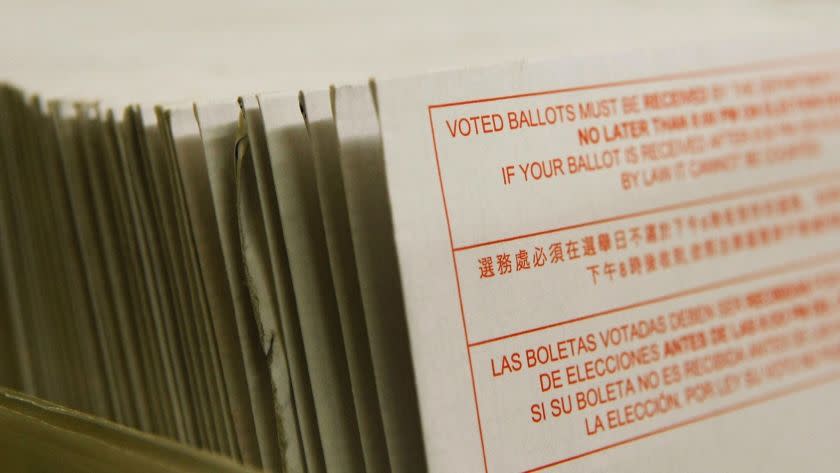 SAN FRANCISCO – JANUARY 24: A stack of vote–by–mail ballots sit in a box after being sorted at the San Francisco Department of Elections January 24, 2008 in San Francisco, California. Absentee balloting in California has become extremely popular in the past few election cycles with an estimated 3.7 million California voters casting absentee ballots in the 2006 general election, close to 42% of the total vote. California voters have been casting their ballots by mail for this years primary election since early January. (Photo by Justin Sullivan/Getty Images)