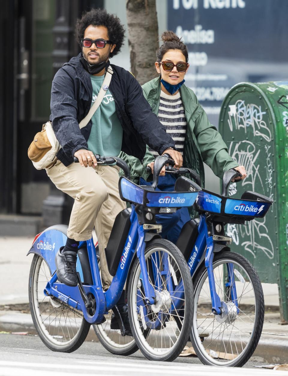 EXCLUSIVE: Katie Holmes and Bobby Wooten III pack on the PDA while on a bike ride and a lunch date in New York City