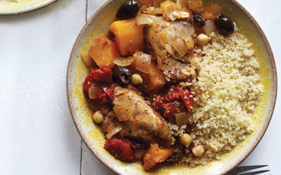 <p>Spiced chicken, butternut squash and tomatoes that have been slow-cooked for hours are the perfect accompaniments for crumbly couscous.</p><p><strong>Get the recipe: <a href="https://parade.com/29522/dash/slow-cooker-moroccan-chicken-with-couscous/" rel="nofollow noopener" target="_blank" data-ylk="slk:Slow Cooker Moroccan Chicken with Couscous;elm:context_link;itc:0;sec:content-canvas" class="link ">Slow Cooker Moroccan Chicken with Couscous</a></strong></p>