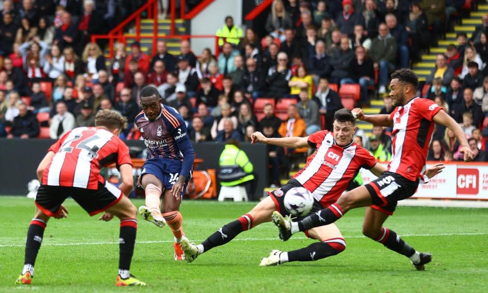 <span>Callum Hudson-Odoi scores Nottingham Forest’s third goal.</span><span>Photograph: Carl Recine/Reuters</span>