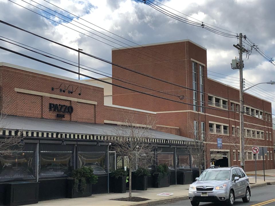 A Red Bank developer has scaled down a proposal to add apartments atop the Pazzo MMX restaurant on West Front Street in Red Bank.
