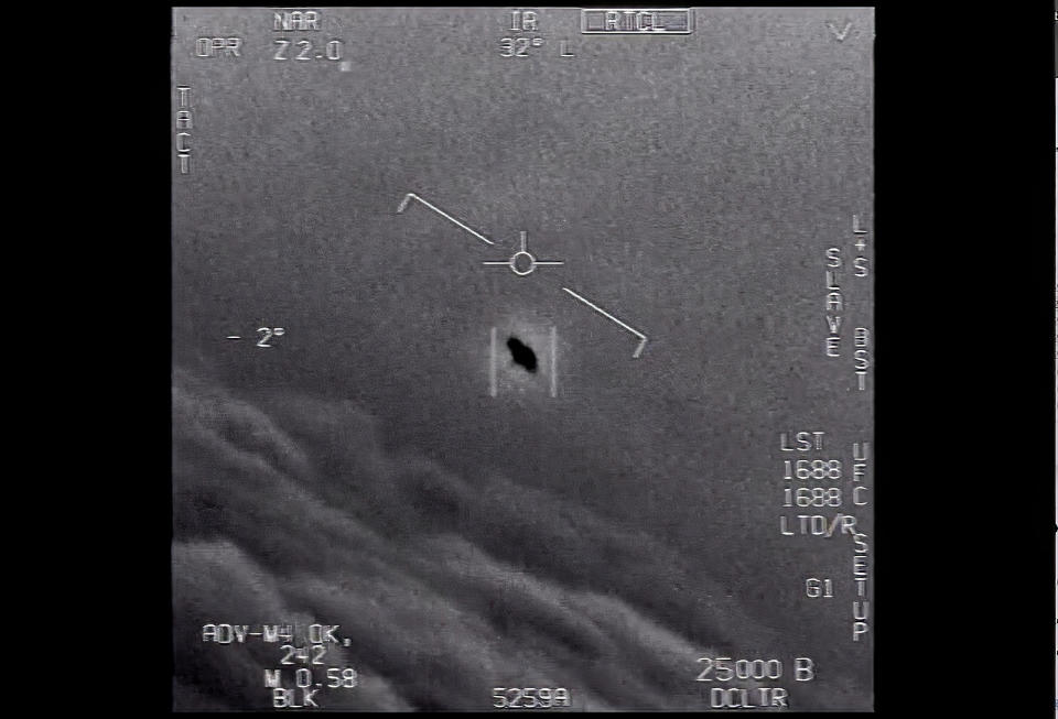 An unexplained object is seen in a fuzzy video in 2015. Source: AP