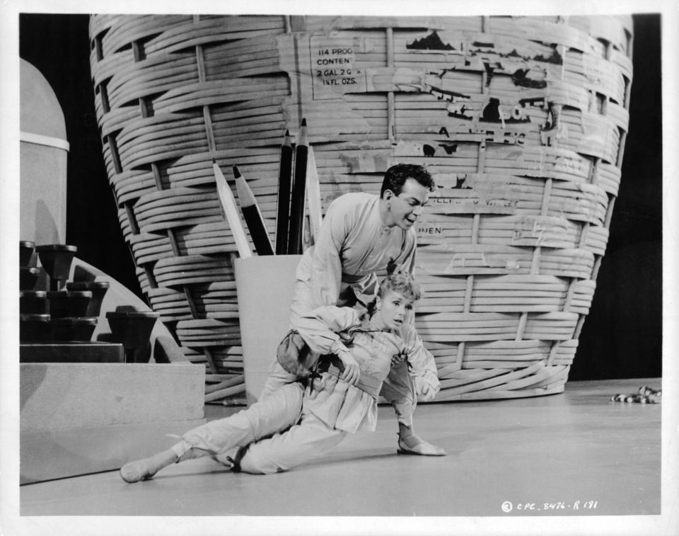 Cantinflas holds up Shirley Jones in a scene from the film 'Pepe', 1960. (Photo by Columbia Pictures/Getty Images)