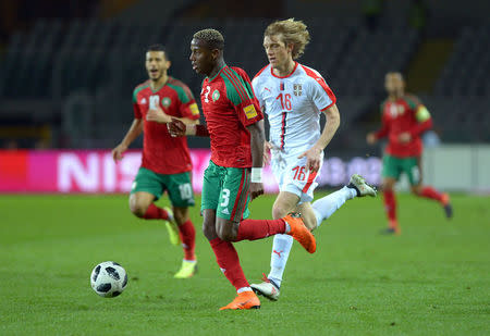 Soccer Football - International Friendly - Serbia vs Morocco - Stadio Olimpico Grande Torino, Turin, Italy - March 23, 2018 Morocco's Hamza Mendyl in action with Serbia's Dusan Basta REUTERS/Massimo Pinca