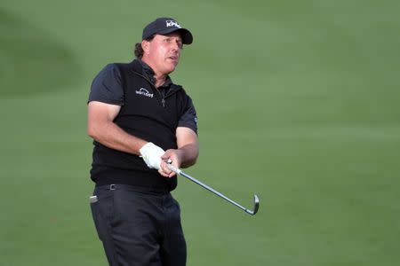 Jan 20, 2019; La Quinta, CA, USA; Phil Mickelson plays his second shot on the 16th hole during the final round of the Desert Classic golf tournament at PGA West - Stadium Course. Mandatory Credit: Orlando Ramirez-USA TODAY Sports