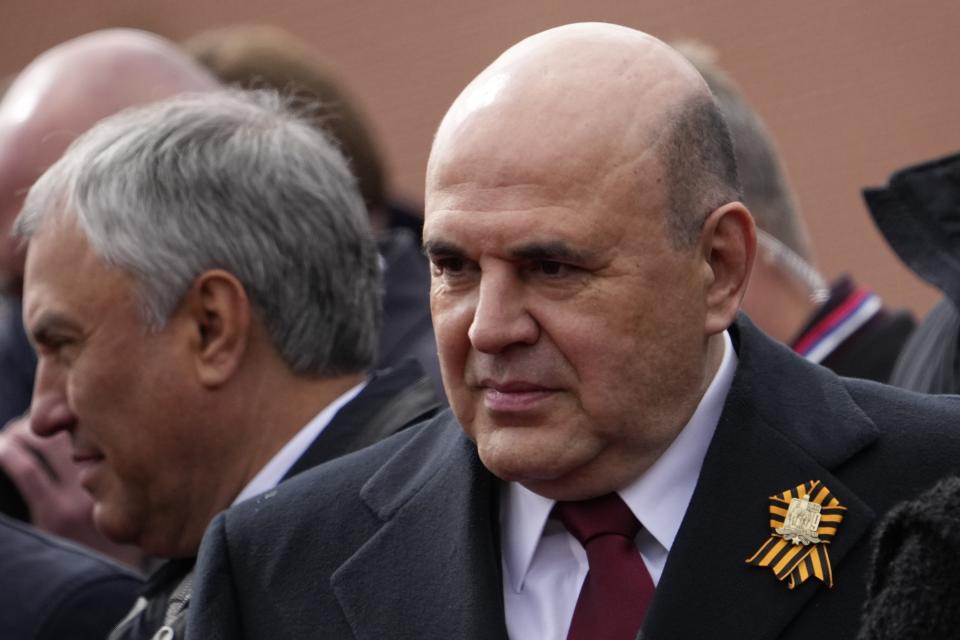 Russian Prime Minister Mikhail Mishustin arrives to attend the Victory Day military parade in Moscow, Russia, Thursday, May 9, 2024, marking the 79th anniversary of the end of World War II. (AP Photo/Alexander Zemlianichenko)