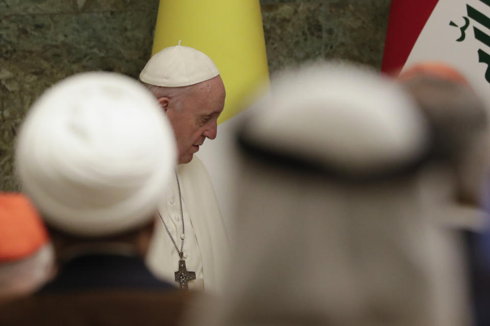 Pope Francis meets authorities at Baghdad's Presidential Palace, Iraq, Friday, March 5, 2021. Pope Francis has arrived in Iraq to urge the country's dwindling number of Christians to stay put and help rebuild the country after years of war and persecution, brushing aside the coronavirus pandemic and security concerns. (AP Photo/Andrew Medichini)