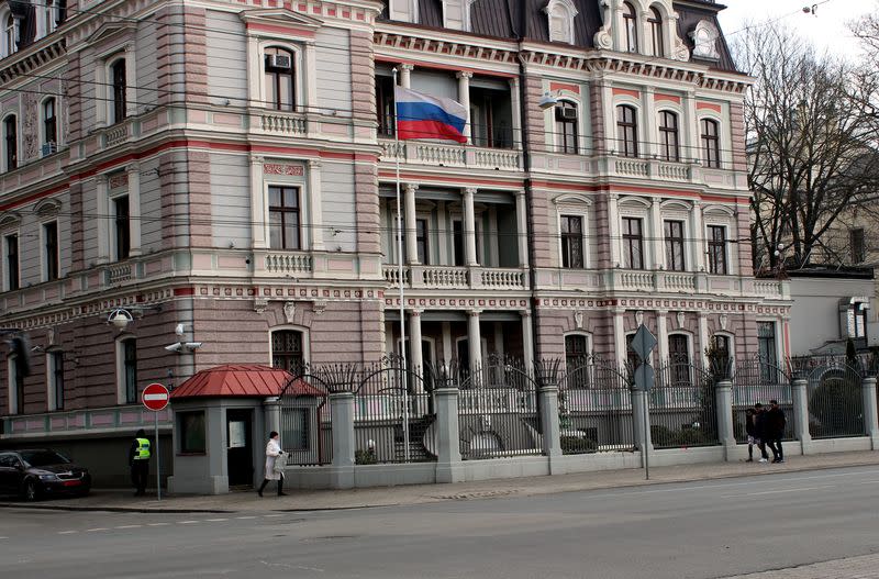 Russia's flag flutters in front of the Russia's Embassy in Riga