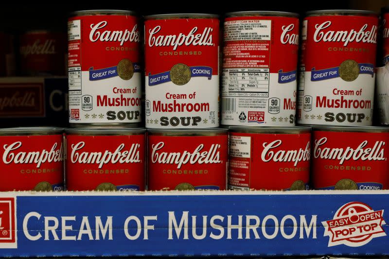 Cans of Campbell's Soup are displayed in a supermarket in New York