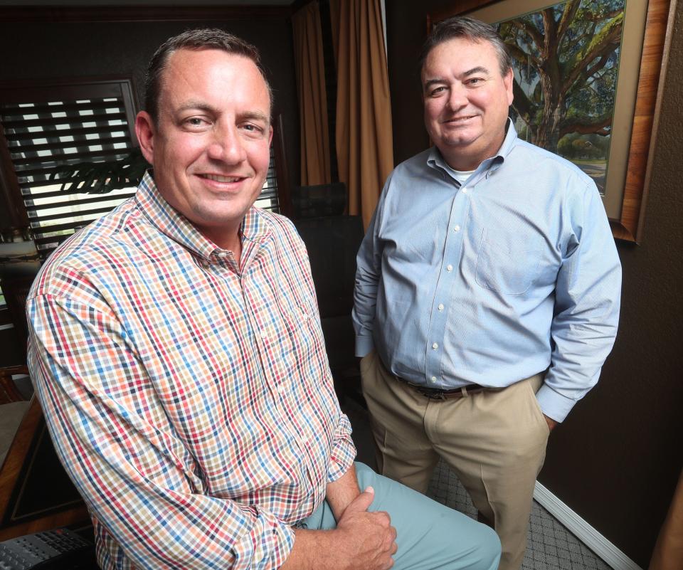 Brothers Ryan and John Adams of the Adams Cameron & Co. Realtors are pictured in the Ormond Beach offices of the company that is marking its 60th anniversary this year in Volusia and Flagler counties. “My father and my grandmother knew the complexities of the market, because to a large extent they created it,” John Adams said of the company's family roots. “At the same time, you can’t rely on what you used to do 60 years ago. You have to know what people will be doing 10 years from now.”