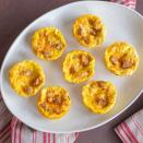 <p>With a little help from your trusty muffin tin, you can meal-prep a week's worth of protein-rich muffin-tin eggs like these with sausage and Gruyère to stash away in the fridge or freezer for those extra-busy mornings. <a href="https://www.eatingwell.com/recipe/279255/muffin-tin-omelets-with-sausage-gruyere/" rel="nofollow noopener" target="_blank" data-ylk="slk:View Recipe" class="link ">View Recipe</a></p>