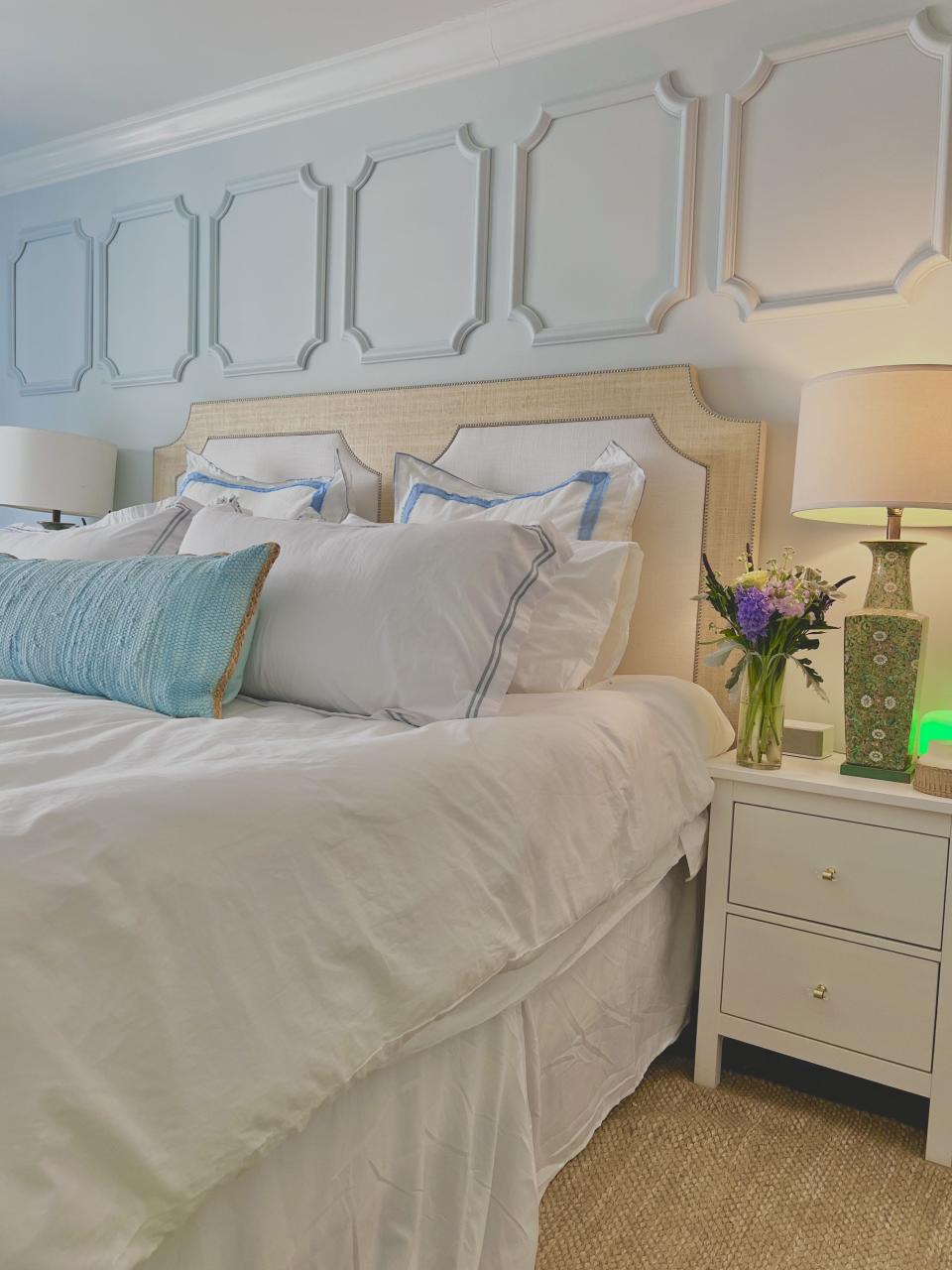 Peel and stick molding in a bedroom redesigned by Clare Sullivan.